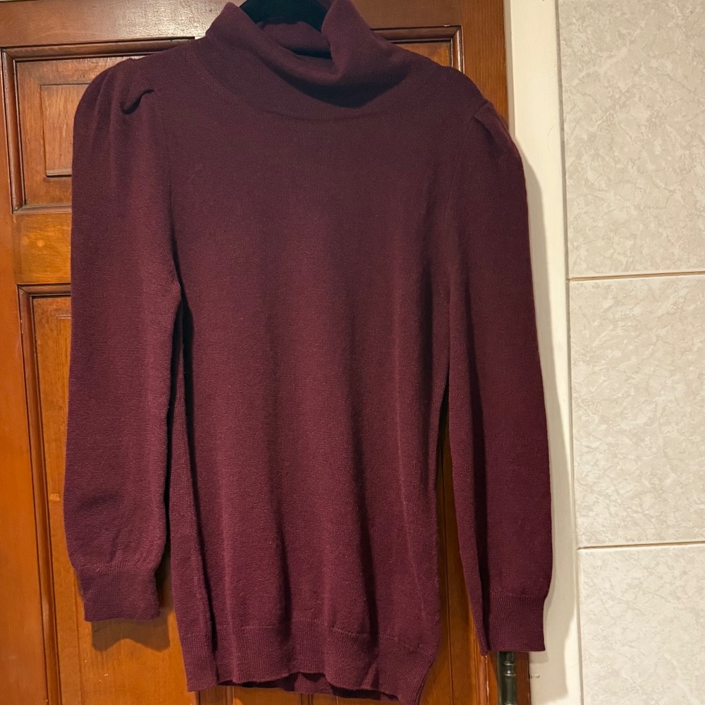 G. Cashmere turtleneck